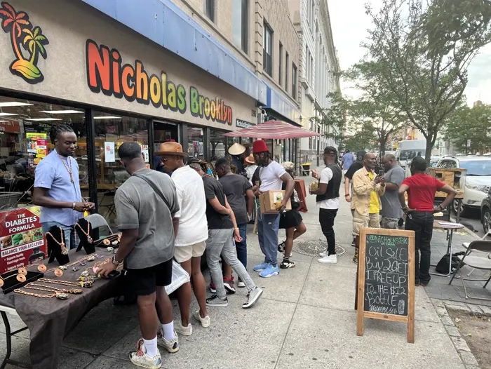 Nicholas Brooklyn storefront during a community event