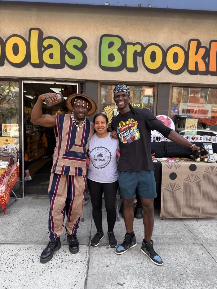 Vendors and staff outside the Nicholas Brooklyn storefront during a community market day
